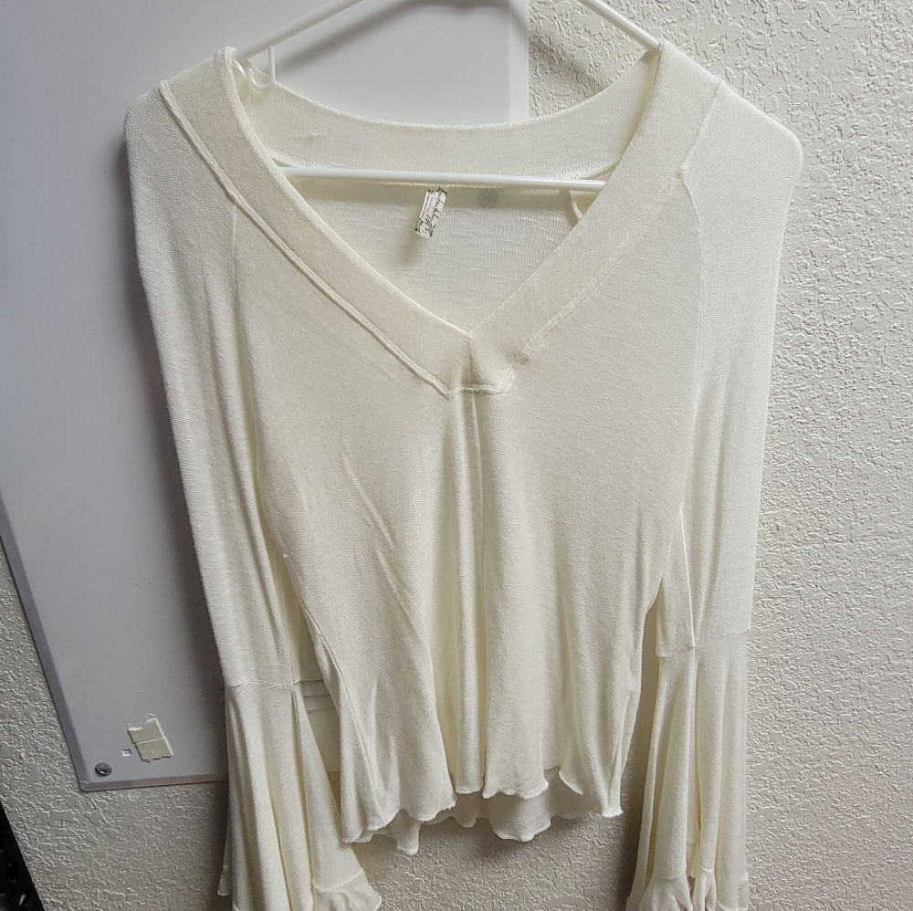 Sweater with bell sleeves